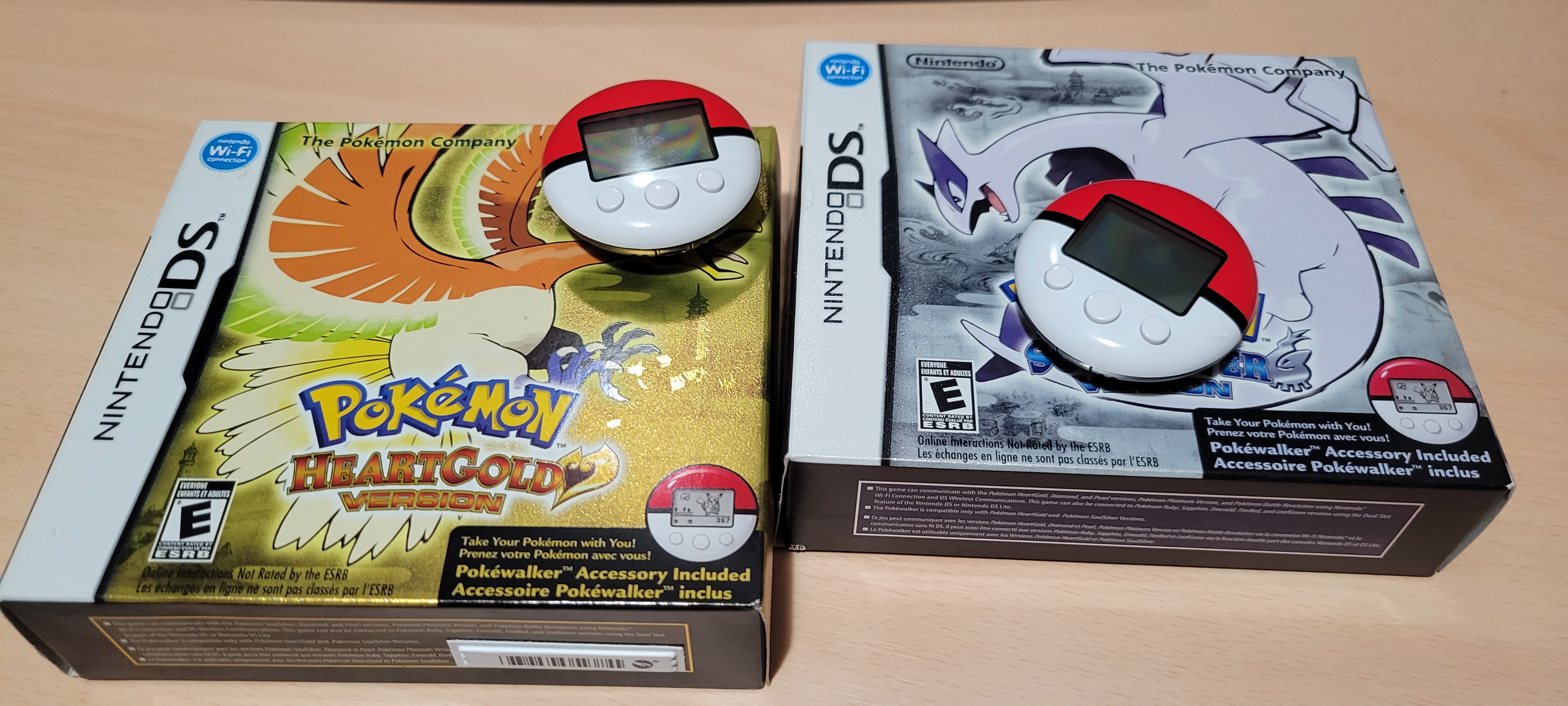 Pokemon HeartGold and Soulsilver with a couple of Pokewalker.